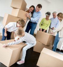 TWicks Family moving house and packing in boxes